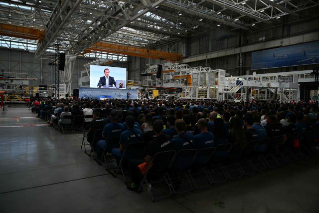 Airbus CEO Guillaume Faury delivers a speech addressing employees of the new Airbus A320 assembly line during its inauguration at the Airbus site in Cornebarrieu, south-western France on June 15, 2026. (Photo by Lionel BONAVENTURE / AFP)