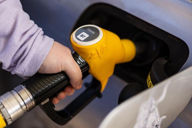 (FILES) A man fills up his car with gazole at an Esso petrol station in Rely, northern France on March 5, 2026. Diesel prices have fallen back below Ђ2 per litre in France, France's Ministry of the Economy announced on June 15, 2026. (Photo by Sameer Al-DOUMY / AFP)