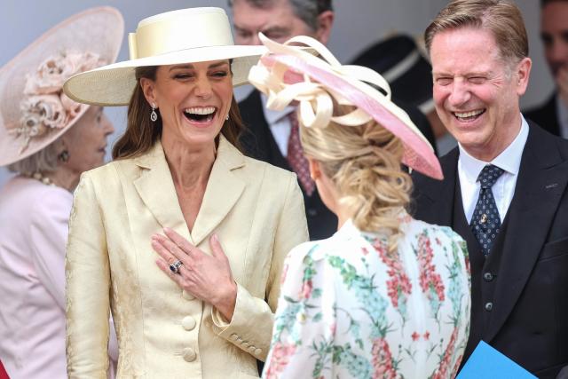 Britain's Catherine, Princess of Wales (L) and Sophie, Duchess of Edinburgh (C) laugh as they attend the annual Order of the Garter service at St. George's Chapel in Windsor Castle, west of London, on June 15, 2026. The Order of the Garter is the oldest and most senior Order of Chivalry in Britain, established by King Edward III nearly 700 years ago. (Photo by Chris Jackson / POOL / AFP)