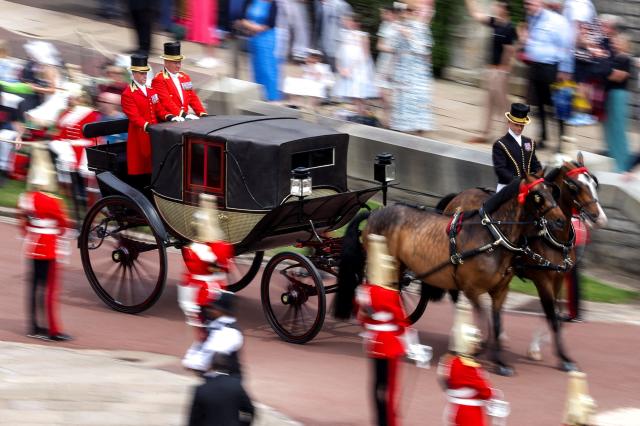 A carriage is moved into a position during the annual Order of the Garter service at St. George's Chapel in Windsor Castle, west of London, on June 15, 2026. The Order of the Garter is the oldest and most senior Order of Chivalry in Britain, established by King Edward III nearly 700 years ago. (Photo by Toby Shepheard / POOL / AFP)