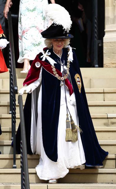 Britain's Queen Camilla leaves after attending the Order of the Garter service at St. George's Chapel in Windsor Castle, west of London, on June 15, 2026. The Order of the Garter is the oldest and most senior Order of Chivalry in Britain, established by King Edward III nearly 700 years ago. (Photo by Henry NICHOLLS / POOL / AFP)