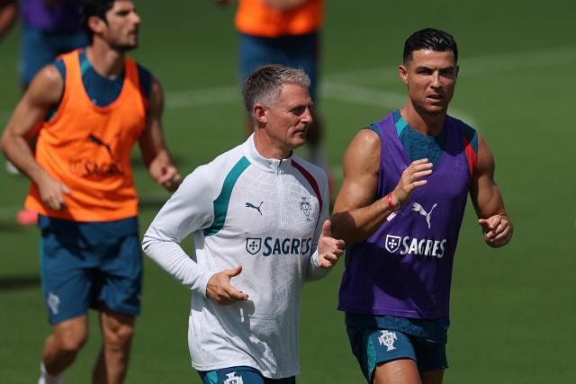 Portugal's forward #07 Cristiano Ronaldo (R) takes part in a training session during the 2026 World Cup football tournament at Gardens North County District Park in Palm Beach Gardens, Florida on June 15, 2026. (Photo by PATRICIA DE MELO MOREIRA / AFP)