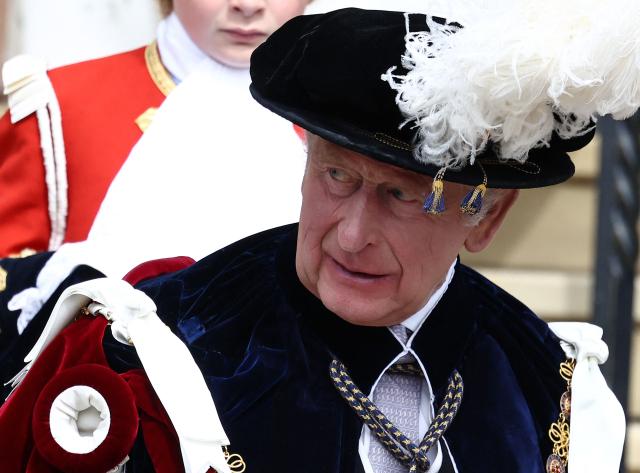 Britain's King Charles III leaves after the Order of the Garter service at St. George's Chapel in Windsor Castle, west of London, on June 15, 2026. The Order of the Garter is the oldest and most senior Order of Chivalry in Britain, established by King Edward III nearly 700 years ago. (Photo by Henry NICHOLLS / POOL / AFP)