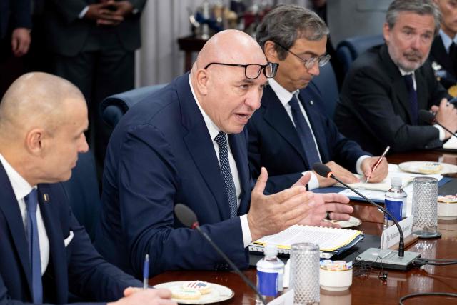 Italian Defense Minister Guido Crosetto (2L), speaks during a meeting with US Secretary of Defense Pete Hegseth at the Pentagon in Washington, DC on June 15, 2026. (Photo by SAUL LOEB / AFP)