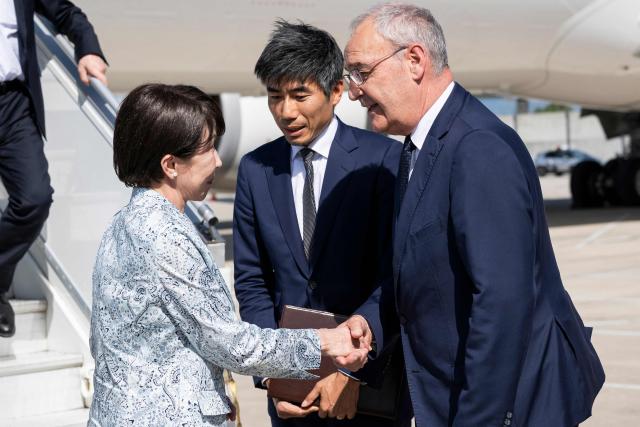 Switzerland's President Guy Parmelin (R) welcomes Japan's Prime Minister Sanae Takaichi as she arrives to attend the G7 summit, in Geneva on June 15, 2026. A G7 summit is set to take place June 15 to 17 in the French town of Evian-les-Bains near Switzerland and it will be attended by country leaders as well as the EU's foreign policy chief and ministers from Brazil, Canada, the United Arab Emirates and Turkey. (Photo by MARTIAL TREZZINI / POOL / AFP)