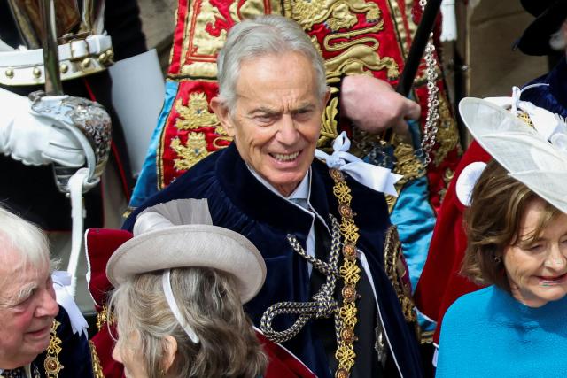Britain's former prime minister Tony Blair (C) and his wife Cherie Blair (R) depart after attending the annual Order of the Garter service at St. George's Chapel in Windsor Castle, west of London, on June 15, 2026. The Order of the Garter is the oldest and most senior Order of Chivalry in Britain, established by King Edward III nearly 700 years ago. (Photo by Toby Shepheard / POOL / AFP)