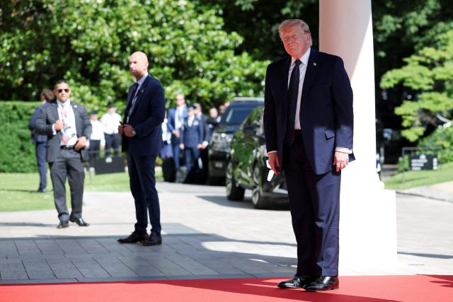 US President Donald Trump arrives for the G7 summit, in Evian, eastern France, on June 15, 2026. A G7 summit is set to take place June 15 to 17 in the French town of Evian-les-Bains near Switzerland and it will be attended by country leaders as well as the EU's foreign policy chief and ministers from Brazil, Canada, the United Arab Emirates and Turkey. (Photo by Isabel Infantes / POOL / AFP)