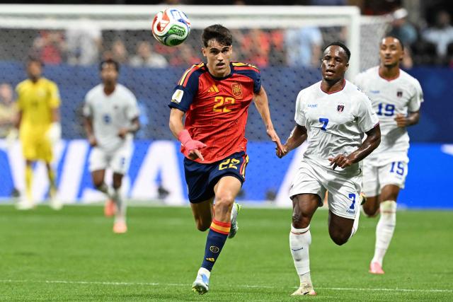 Spain's defender #22 Pau Cubarsi (L) and Cape Verde's forward #07 Jovane Cabral (R) run after the ball during the 2026 World Cup Group H football match between Spain and Cape Verde at the Atlanta Stadium in Atlanta on June 15, 2026.  (Photo by Roberto SCHMIDT / AFP)