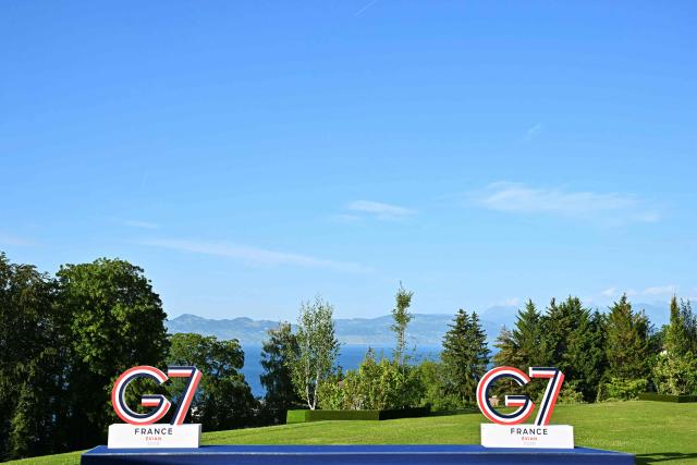 This photograph shows G7 logos during the G7 summit, in Evian, eastern France, on June 15, 2026. A G7 summit is set to take place June 15 to 17 in the French town of Evian-les-Bains near Switzerland and it will be attended by country leaders as well as the EU's foreign policy chief and ministers from Brazil, Canada, the United Arab Emirates and Turkey. (Photo by Mandel NGAN / AFP)