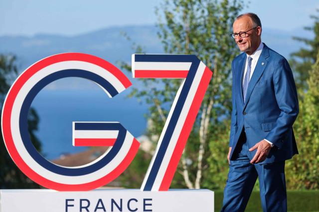 Germany's Chancellor Friedrich Merz arrives for the official greeting during the G7 summit, in Evian, eastern France, on June 15, 2026. A G7 summit is set to take place June 15 to 17 in the French town of Evian-les-Bains near Switzerland and it will be attended by country leaders as well as the EU's foreign policy chief and ministers from Brazil, Canada, the United Arab Emirates and Turkey. (Photo by Ludovic MARIN / AFP)