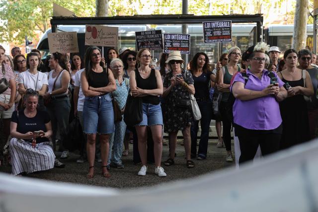 Protestors gather outside Toulouse courthouse to demand a law against violence towards minors following the death of 11-year Lyhanna, in Toulouse, on June 15, 2026. (Photo by Valentine CHAPUIS / AFP)