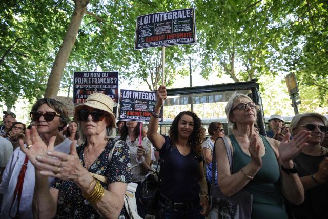 Protestors gather outside Toulouse courthouse to demand a law against violence towards minors, in Toulouse, on June 15, 2026. (Photo by Valentine CHAPUIS / AFP)