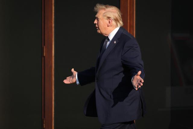 US President Donald Trump gestures as he arrives for the official greeting during the G7 summit, in Evian, eastern France, on June 15, 2026. A G7 summit is set to take place June 15 to 17 in the French town of Evian-les-Bains near Switzerland and it will be attended by country leaders as well as the EU's foreign policy chief and ministers from Brazil, Canada, the United Arab Emirates and Turkey. (Photo by Ludovic MARIN / AFP)