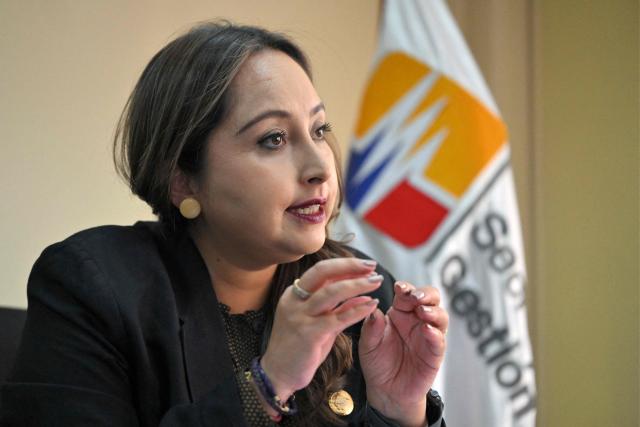 Ecuador's Risk Management Secretary Carolina Lozano speaks during an interview with AFP at her office in Quito on June 15, 2026. Ecuador estimates that the impact of the 2026–27 El Niсo will be "moderate" in its territory, where the climate phenomenon has left hundreds dead and caused multimillion-dollar losses in previous years, the Risk Management secretary told AFP on June 15, 2026. (Photo by Rodrigo BUENDIA / AFP)