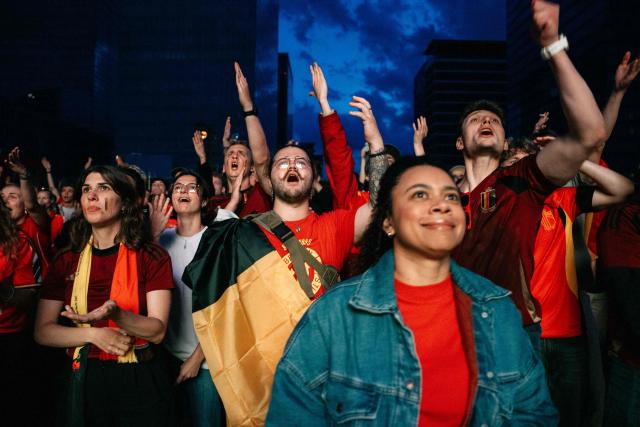Belgium supporters react as they watch the screening of the 2026 World Cup football tournament Group G match between Belgium and Egypt, in Brussels on June 15, 2026. (Photo by Marius Burgelman / Belga / AFP) / Belgium OUT