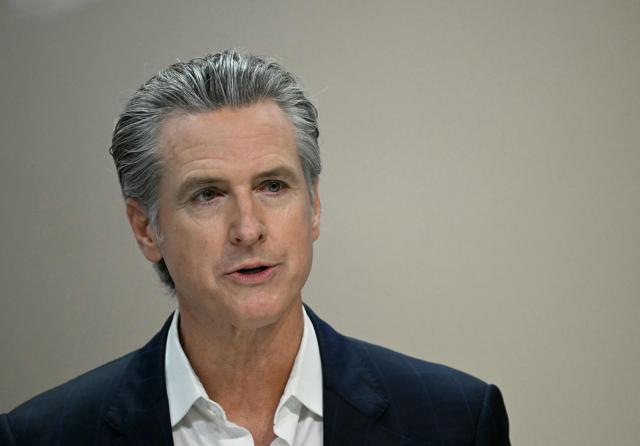 (FILES) Governor of California Gavin Newsom attends a press conference during the COP30 UN Climate Change Conference in Belem, Para State, Brazil on November 11, 2025. California's Democratic Governor Gavin Newsom, a likely White House contender in 2028, on June 15, 2026 accused Republican President Donald Trump of launching a criminal investigation against him as a "personal vendetta." Newsom said federal agents had questioned friends and associates of him and his wife, as well as sifting through "years and years of random documents." (Photo by Mauro PIMENTEL / AFP)