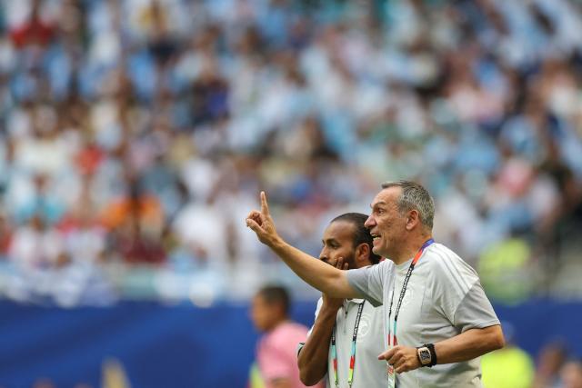 Saudi Arabia's Greek head coach Giorgos Donis gestures during the 2026 World Cup Group H football match between Saudi Arabia and Uruguay at the Miami Stadium in Miami Gardens on June 15, 2026.  (Photo by PATRICIA DE MELO MOREIRA / AFP)