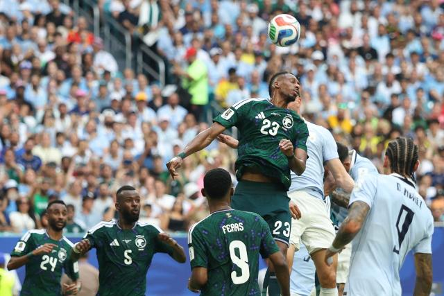 Saudi Arabia's midfielder #23 Mohamed Kanno clears the ball during the 2026 World Cup Group H football match between Saudi Arabia and Uruguay at the Miami Stadium in Miami Gardens on June 15, 2026.  (Photo by PATRICIA DE MELO MOREIRA / AFP)