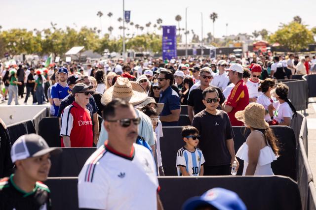 Fans wait in line to go through security at Los Angeles Stadium (SoFi Stadium) ahead of the 2026 World Cup Group G football match between Iran and New Zealand in Inglewood, California, on June 15, 2026. (Photo by ETIENNE LAURENT / AFP)