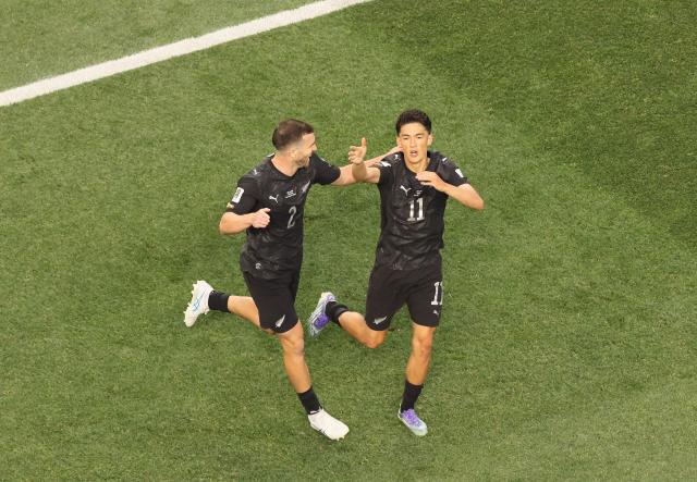 New Zealand's forward #11 Elijah Just celebrates scoring his team's second goal during the 2026 World Cup Group G football match between Iran and New Zealand at Los Angeles Stadium in Inglewood on June 15, 2026.  (Photo by Etienne Laurent / AFP)