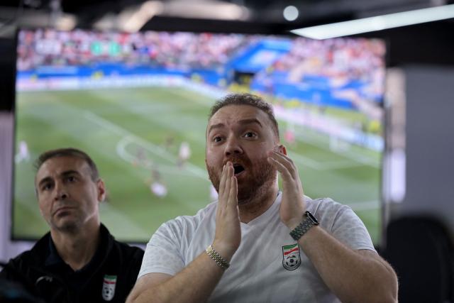 Iranian fans watch the 2026 World Cup Group G football match between Iran and New Zealand at the Chamber of Commerce in Tijuana, Mexico on June 15, 2026. (Photo by Guillermo Arias / AFP)