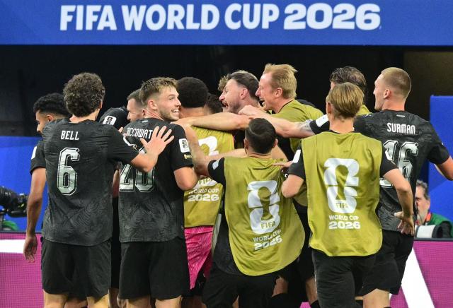 New Zealand's forward #11 Elijah Just celebrates with teammates after scoring his team's second goal during the 2026 World Cup Group G football match between Iran and New Zealand at Los Angeles Stadium in Inglewood on June 15, 2026.  (Photo by Frederic J. Brown / AFP)
