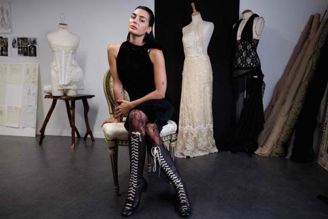 (FILES) Spanish designer, creative director and stylist, Maria Bernad, creator of "Les Fleurs studio" poses for a portrait at her atelier in Paris on May 5, 2026. Lace is making a big comeback in fashion, bringing a touch of craftsmanship and delicacy, and this traditional fabric is now even being recycled to create unique pieces worn by stars such as Beyonce and Rosalia. (Photo by SIMON WOHLFAHRT / AFP)