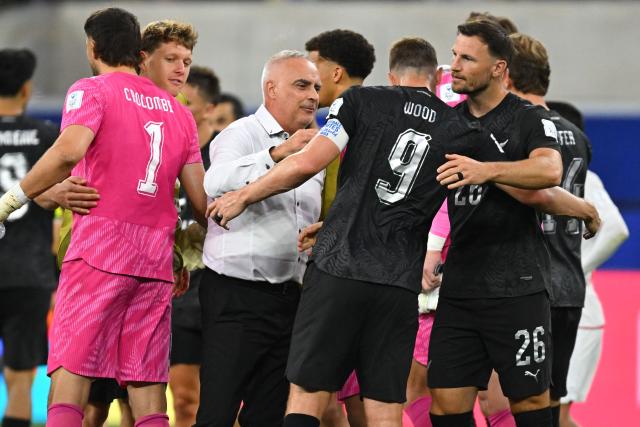 New Zealand's head coach Darren Bazeley greets his players after the 2026 World Cup Group G football match between Iran and New Zealand at Los Angeles Stadium in Inglewood on June 15, 2026.  (Photo by Patrick T. Fallon / AFP)