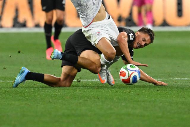 New Zealand's midfielder #23 Ryan Thomas falls on the ground during the 2026 World Cup Group G football match between Iran and New Zealand at Los Angeles Stadium in Inglewood on June 15, 2026.  (Photo by Patrick T. Fallon / AFP)