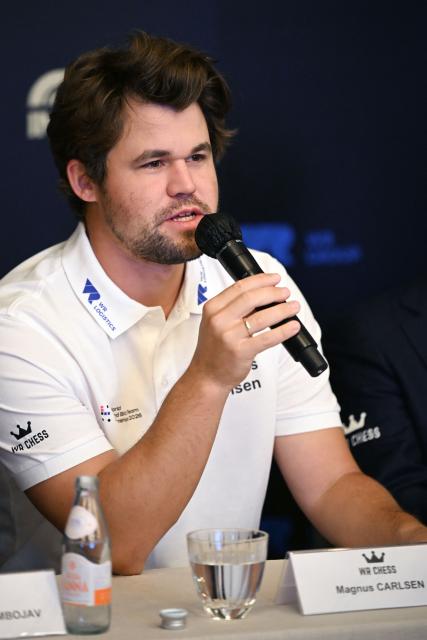 Norwegian chess grandmaster Magnus Carlsen speaks at a press conference ahead of the FIDE World Team Rapid and Blitz Chess Championships in Hong Kong on June 16, 2026. This year's chess tournament will be held in the city from June 16-22. (Photo by Peter PARKS / AFP)