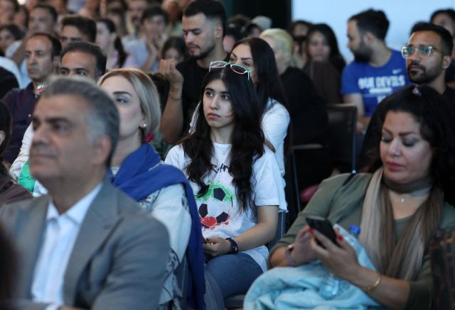 Iranians watch the 2026 World Cup football tournament match between Iran and New Zealand at Tehran Book Garden in Tehran, Iran, on June 16, 2026. (Photo by AFP)