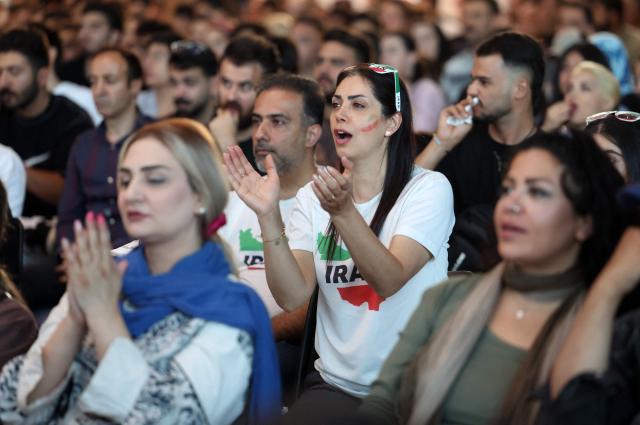 Iranians watch the 2026 World Cup football tournament match between Iran and New Zealand at Tehran Book Garden in Tehran, Iran, on June 16, 2026. (Photo by AFP)