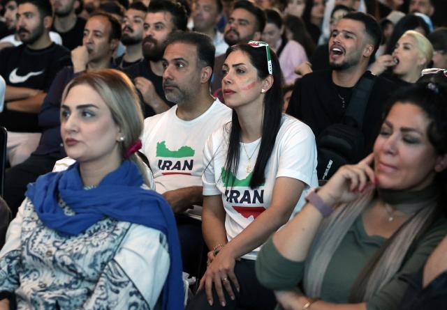 Iranians watch the 2026 World Cup football tournament match between Iran and New Zealand at Tehran Book Garden in Tehran, Iran, on June 16, 2026. (Photo by AFP)