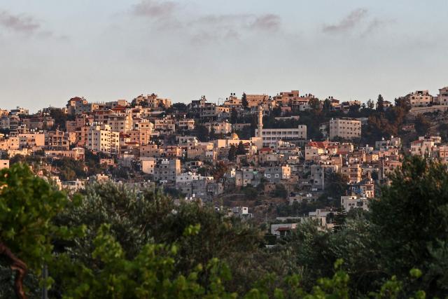 A general view of the town of Sinjil, north of Ramallah in the Israeli-occupied Palestinian West Bank on June 15, 2026. (Photo by Zain JAAFAR / AFP)