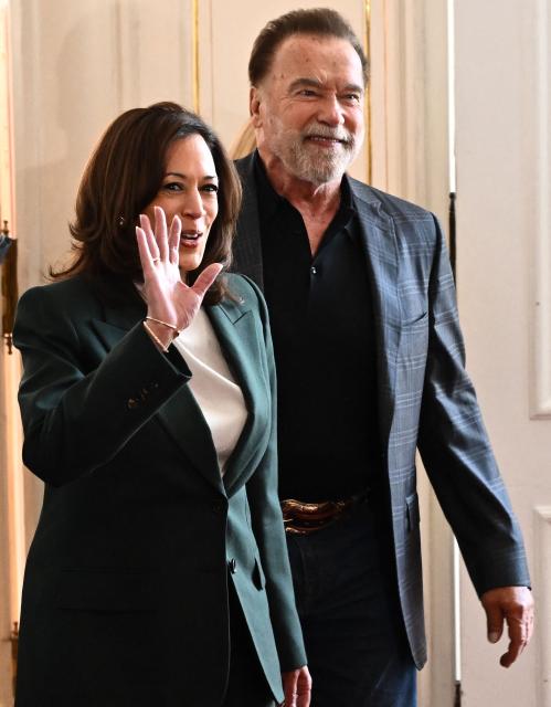 US-Austrian actor, businessman and former Governor of California Arnold Schwarzenegger (R), who is the founder of The Schwarzenegger Climate Initiative and former US Vice-President Kamala Harris arrive to attend the Austrian World Summit of the Schwarzenegger Climate Initiative on June 16, 2026 in Vienna, Austria. The annual conference's main goal is, according to its organisers, "to offer a broad platform for concrete solutions and successful ideas that motivate and act as role models as well as connect people, businesses and climate leaders". (Photo by Joe Klamar / AFP)