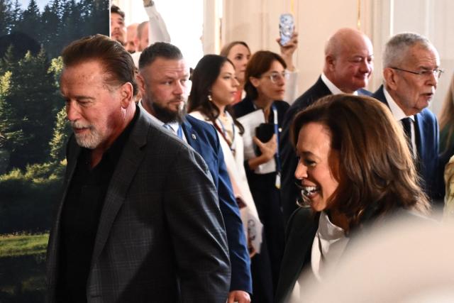 US-Austrian actor, businessman and former Governor of California Arnold Schwarzenegger (L), who is the founder of The Schwarzenegger Climate Initiative and former US Vice-President Kamala Harris arrive to attend the Austrian World Summit of the Schwarzenegger Climate Initiative on June 16, 2026 in Vienna, Austria. The annual conference's main goal is, according to its organisers, "to offer a broad platform for concrete solutions and successful ideas that motivate and act as role models as well as connect people, businesses and climate leaders". (Photo by Joe Klamar / AFP)