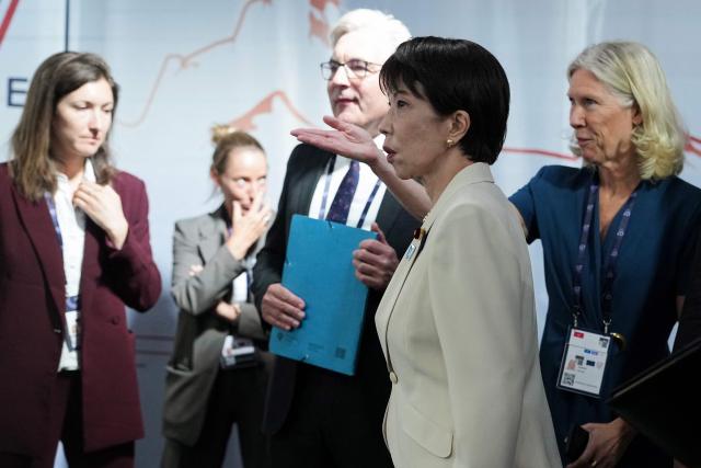 Japan's Prime Minister Sanae Takaichi arrives prior to a working session at the G7 summit in Evian-les-Bains, central-eastern France on June 16, 2026. (Photo by Thibault Camus / POOL / AFP)