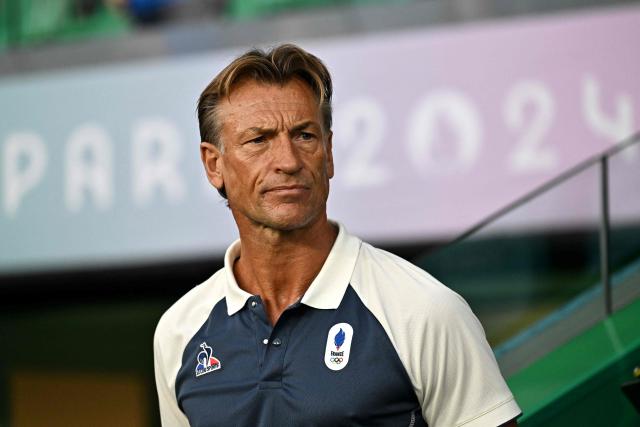 (FILES) France's coach Herve Renard looks on in the women's group A football match between France and Canada during the Paris 2024 Olympic Games at the Geoffroy-Guichard Stadium in Saint-Etienne on July 28, 2024. Tunisia have responded to their 5-1 World Cup thrashing by Sweden by sacking coach Sabri Lamouchi and replacing him with Frenchman Herve Renard, the federation announced on national TV late June 15, 2026. (Photo by Arnaud FINISTRE / AFP)