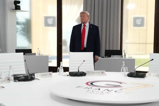 US President Donald Trump looks on ahead of a working session at the G7 summit in Evian-les-Bains, central-eastern France on June 16, 2026. (Photo by Thibault Camus / POOL / AFP)