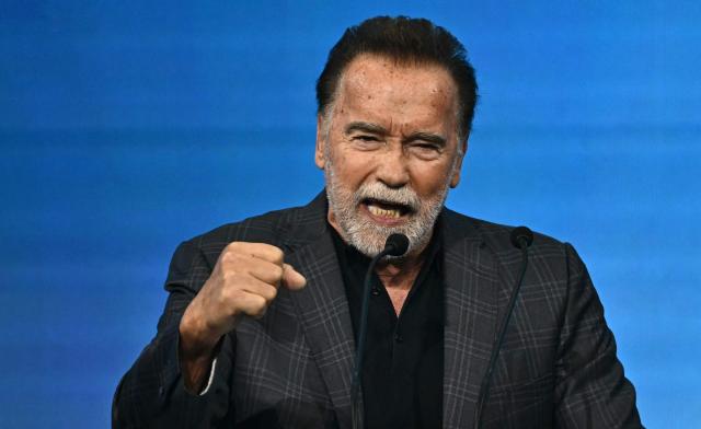 US-Austrian actor and former Governor of California Arnold Schwarzenegger speaks at the Schwarzenegger Climate Initiative the Austrian World Summit of the Schwarzenegger Climate Initiative on June 16, 2026 in Vienna, Austria. The annual conference's main goal is, according to its organisers, "to offer a broad platform for concrete solutions and successful ideas that motivate and act as role models as well as connect people, businesses and climate leaders". (Photo by Joe Klamar / AFP)
