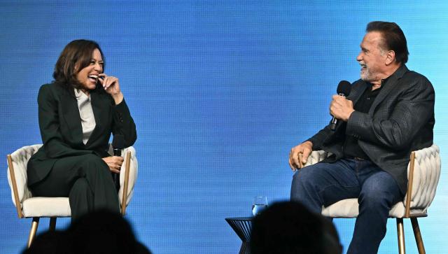 US-Austrian actor and former Governor of California Arnold Schwarzenegger (R) and former US Vice-President Kamala Harris talk during a panel discussion at the Austrian World Summit of the Schwarzenegger Climate Initiative on June 16, 2026 in Vienna, Austria. The annual conference's main goal is, according to its organisers, "to offer a broad platform for concrete solutions and successful ideas that motivate and act as role models as well as connect people, businesses and climate leaders". (Photo by Joe Klamar / AFP)