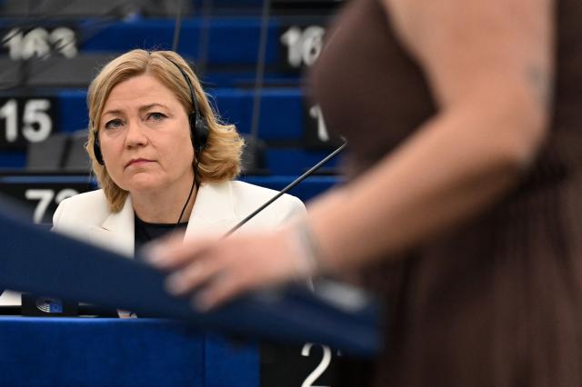 Executive vice-president of the European commission of Tech Sovereignty, Security and Democracy Henna Virkunnen listens to a MEP after delivering her speech on 'Digital sovereignty and resilience for Europe, in light of developments affecting access to AI technologies' during a plenary session at The European Parliament in Strasbourg, eastern France on June 16, 2026. (Photo by Jean-Christophe VERHAEGEN / AFP)