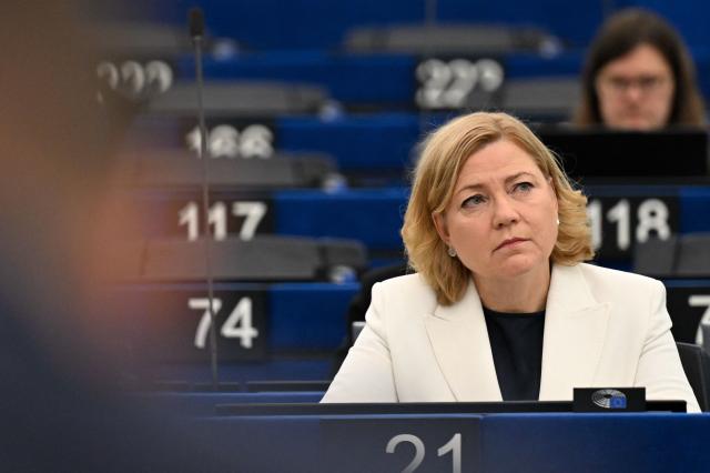 Executive vice-president of the European commission of Tech Sovereignty, Security and Democracy Henna Virkunnen listens to a MEP after delivering her speech on 'Digital sovereignty and resilience for Europe, in light of developments affecting access to AI technologies' during a plenary session at The European Parliament in Strasbourg, eastern France on June 16, 2026. (Photo by Jean-Christophe VERHAEGEN / AFP)
