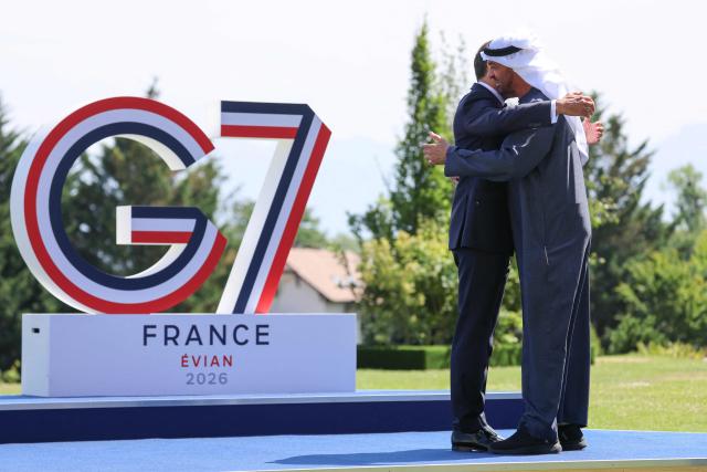 France's President Emmanuel Macron (L) welcomes United Arab Emirates' Crown prince Mohammed Bin Zayed Al Nahyan for the official greeting ahead of a work lunch as part of the G7 summit, in Evian, eastern France, on June 16, 2026. A G7 summit is set to take place June 15 to 17 in the French town of Evian-les-Bains near Switzerland and it will be attended by country leaders as well as the EU's foreign policy chief and ministers from Brazil, Canada, the United Arab Emirates and Turkey. (Photo by Ludovic MARIN / AFP)