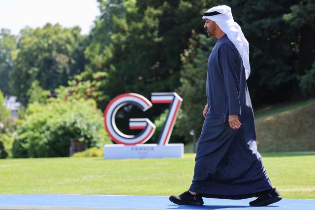 United Arab Emirates' Crown prince Mohammed Bin Zayed Al Nahyan arrives for the official greeting ahead of a work lunch as part of the G7 summit, in Evian, eastern France, on June 16, 2026. A G7 summit is set to take place June 15 to 17 in the French town of Evian-les-Bains near Switzerland and it will be attended by country leaders as well as the EU's foreign policy chief and ministers from Brazil, Canada, the United Arab Emirates and Turkey. (Photo by Ludovic MARIN / AFP)