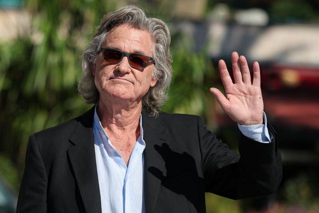 US actor Kurt Russel waves as he arrives to attend the 65th Monte-Carlo Television Festival in the principality of Monaco on June 16, 2026. (Photo by Valery HACHE / AFP)