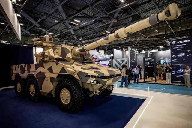 This photograph shows a view of French manufacturer of armoured vehicles Arquus', a member of Belgium's John Cockerill group, new vehicle Fenris displayed during Eurosatory land and airland defence andsecurity trade fair, at the Paris-Nord Villepinte Exhibition Centre in Villepinte, north of Paris on June 15, 2026. Twelve Israeli stands were closed at the Eurosatory defence and security exhibition, which opened on today, for failing to comply with the conditions that had been set, according to a statement received by AFP from the organising company, Coges Events. (Photo by Guillaume BAPTISTE / AFP)