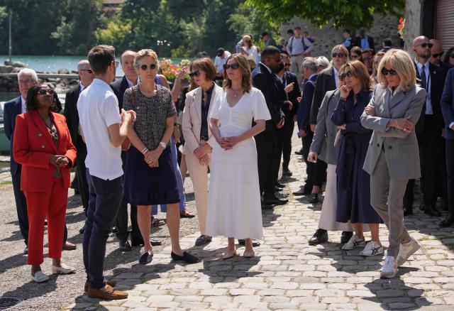 (From L) Leaders' spouses including Kenya's Rachel Kimetto, Canada's Diana Fox Carney, Germany's Charlotte Merz, Britain's Victoria Starmer, Brazil's Rosangela "Janja" da Silva and France's Brigitte Macron attend a spouses' event on the sidelines of the G7 summit, in Yvoire, eastern France, on June 16, 2026. A G7 summit is set to take place June 15 to 17 in the French town of Evian-les-Bains near Switzerland and it will be attended by country leaders as well as the EU's foreign policy chief and ministers from Brazil, Canada, the United Arab Emirates and Turkey. (Photo by Christophe Ena / POOL / AFP)