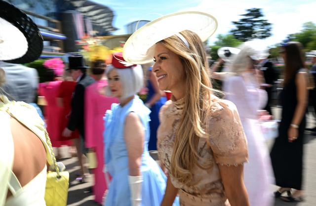 Racegoers arrive on the first day of the Royal Ascot horse racing meeting in Ascot, west of London, on June 16, 2026. (Photo by JUSTIN TALLIS / AFP)