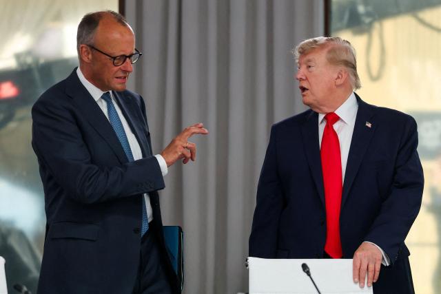 Germany’s Chancellor Friedrich Merz and US President Donald Trump attend a work lunch as part of the G7 summit, in Evian, eastern France, on June 16, 2026. A G7 summit is set to take place June 15 to 17 in the French town of Evian-les-Bains near Switzerland and it will be attended by country leaders as well as the EU's foreign policy chief and ministers from Brazil, Canada, the United Arab Emirates and Turkey. (Photo by Christian Hartmann / POOL / AFP)